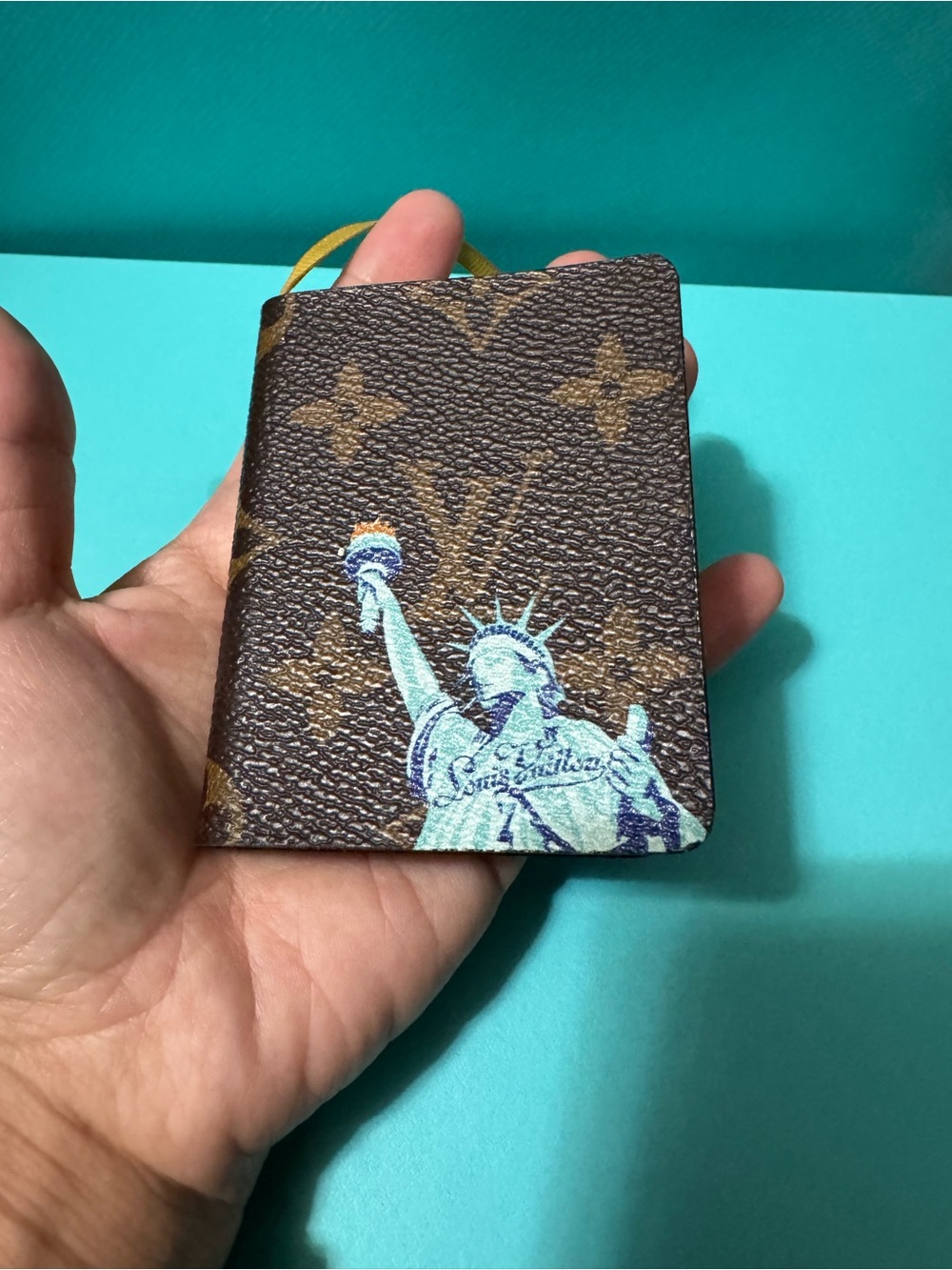 Louis Vuitton Brown Monogram Passport Cover with Blue-Cream Statue Motif - Picture 8 of 11